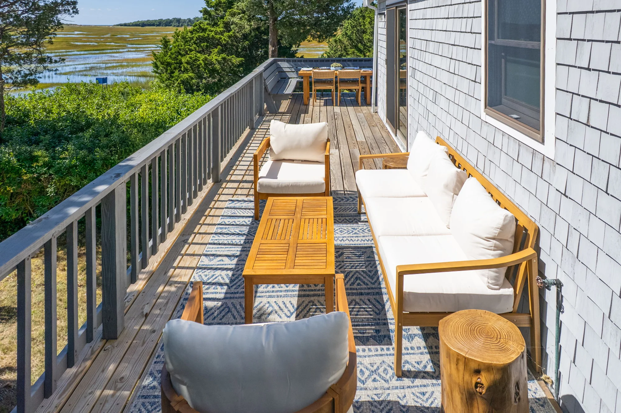 Comfortable deck seating overlooking the estuary